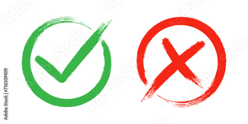 Two dirty grunge cross x and tick OK check marks in check boxes, hand drawn with brush strokes vector illustration isolated on white background. Check mark symbol NO and YES buttons for web vote, etc. photo