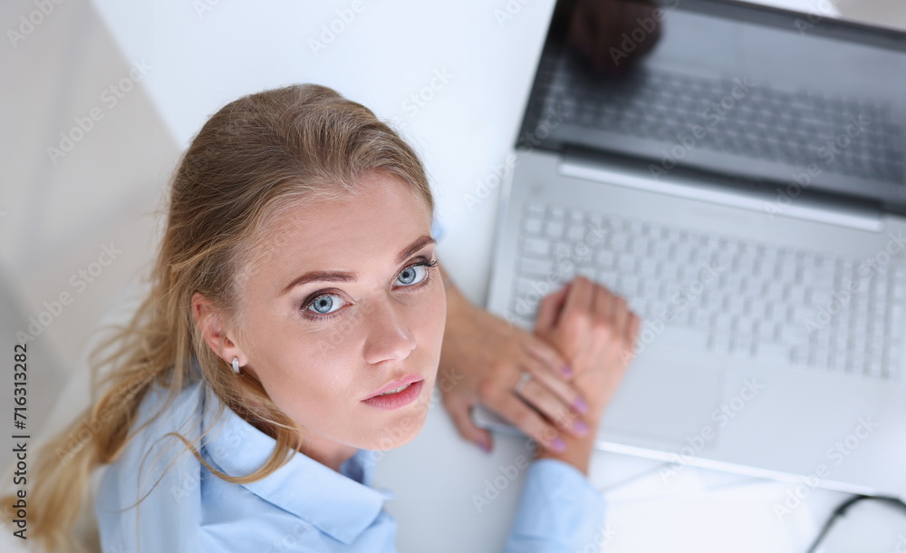 Beautiful smiling businesswoman portrait at workplace look in camera. White collar worker at workspace exchange market job offer certified public accountant internal Revenue officer concept Beautiful smiling businesswoman portrait at workplace look in camera. White collar worker at workspace exchange market job offer certified public accountant internal Revenue officer concept