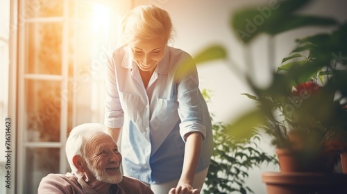 Woman nurse assists senior man for healthcare and support at home, medical caregiver