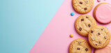 Crunchy golden chocolate chip cookies adorned with pink sprinkles on a pastel backdrop.