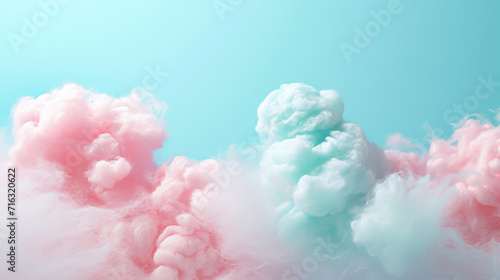 Swirls of pink and blue cotton candy in a dreamy pastel cloudscape. photo
