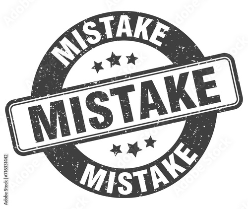 mistake stamp. mistake label. round grunge sign