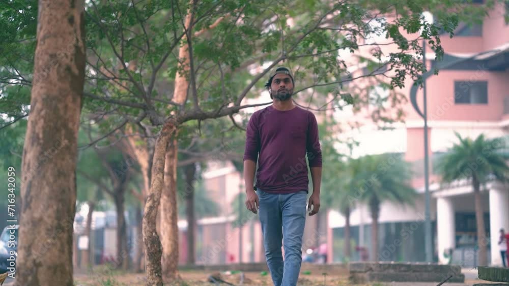 Young Boy Walking Tree street, Sad Boy Walking On commercial area, person walking on the street, legs of a person in a commercial area stock video. Young Boy Walking Tree street, Sad Boy Walking On commercial area, person walking on the street, legs of a person in a commercial area stock video.