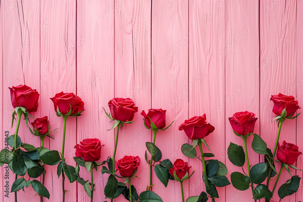 Elegant Red Roses on Pink Wooden Background