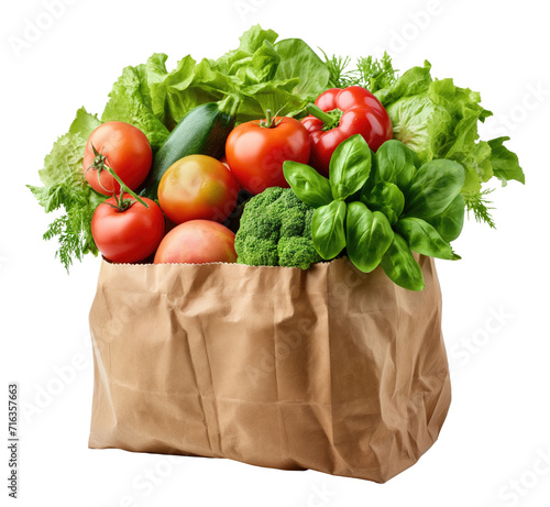 Paper bag with vegetables and fruits isolated.