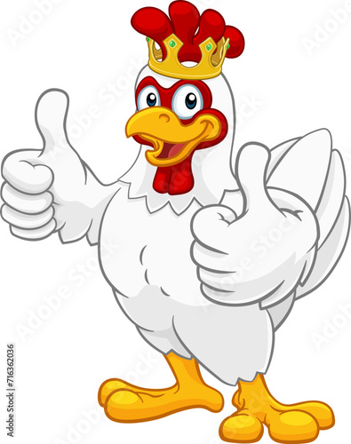 A chicken rooster cockerel bird cartoon character in a kings gold crown giving a double thumbs up