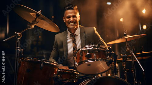 A full body male drummer, natural sunlight pouring in, dressed in a professional suit