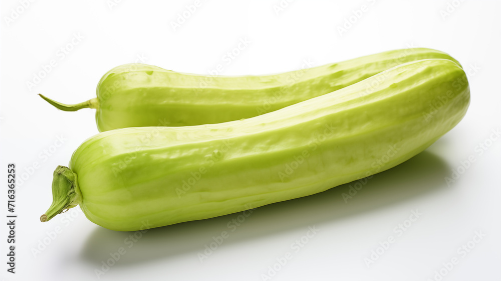 A captivating image featuring fresh chayote against a clean white backdrop, showcasing its vibrant green hue and versatile culinary appeal. A minimalist and elegant visual, perfect for culinary or art A captivating image featuring fresh chayote against a clean white backdrop, showcasing its vibrant green hue and versatile culinary appeal. A minimalist and elegant visual, perfect for culinary or art
