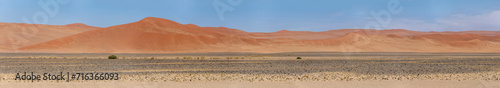 smooth slopes and shades of red on big dunes at Naukluft desert, near Sossusvlei, Namibia