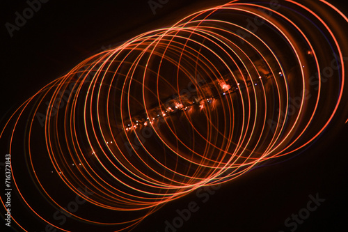 abstract background of red spirals of lines of circles.