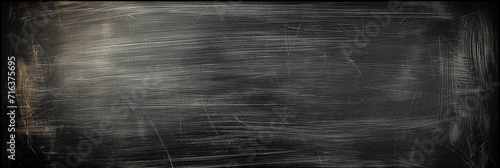 Scratched blackboard texture with copy space for educational concepts, back to school backgrounds, or chalkboard-related designs