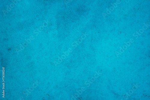 Dark blue concrete stone texture for background in summer wallpaper. Cement and sand wall of tone vintage minimal. Concrete abstract wall of light cyan color, cement texture mint green for design.