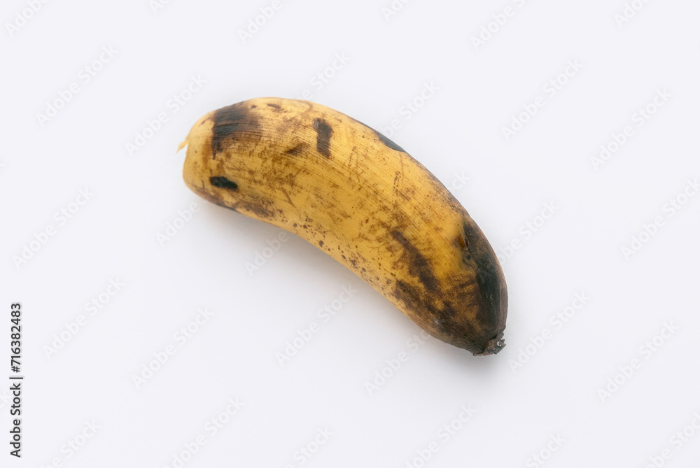 Rotten banana isolated on white