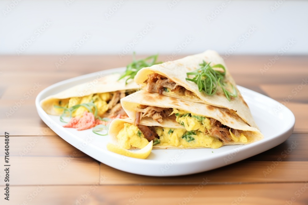 quesadilla filled with sausage and scrambled eggs quesadilla filled with sausage and scrambled eggs