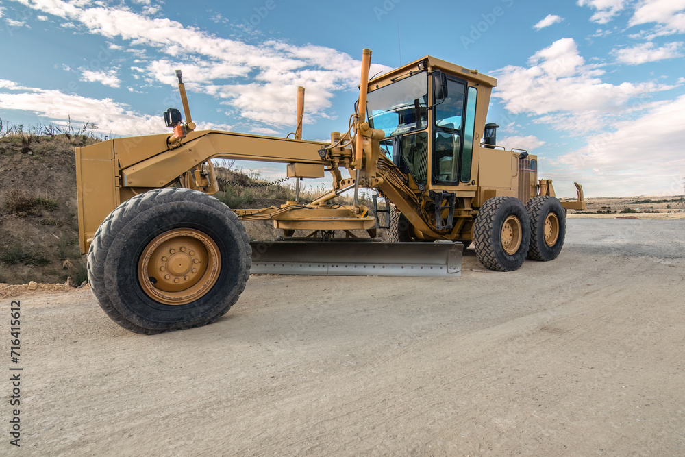 Grader machine at road construction sites Grader machine at road construction sites