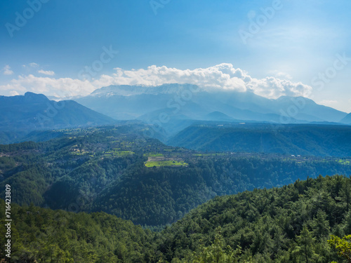 View of a beautiful green mountain valley with different heights of mountains. Beautiful landscape in the mountains of Turkey. Hike concept. No people © Anastasiia