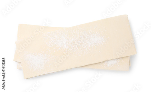 Raw puff pastry dough isolated on white, top view