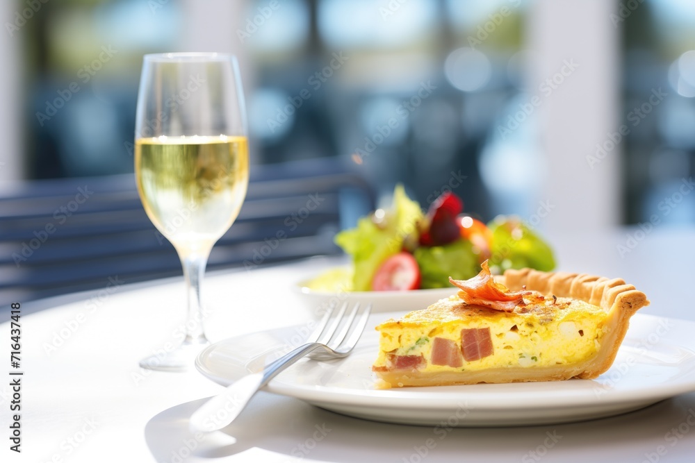quiche lorraine with a glass of white wine for lunch quiche lorraine with a glass of white wine for lunch