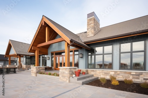 prairie guesthouse, mix of stonework and wooden accents photo