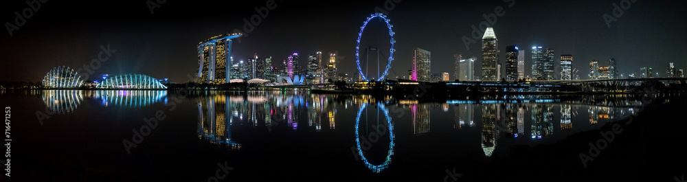 Panorama of Singapore city skyline at night. 