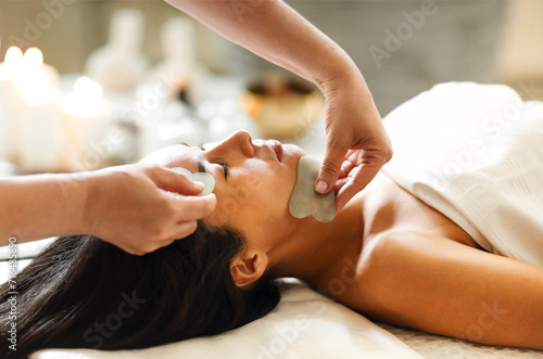 Face massage or beauty treatment in spa salon