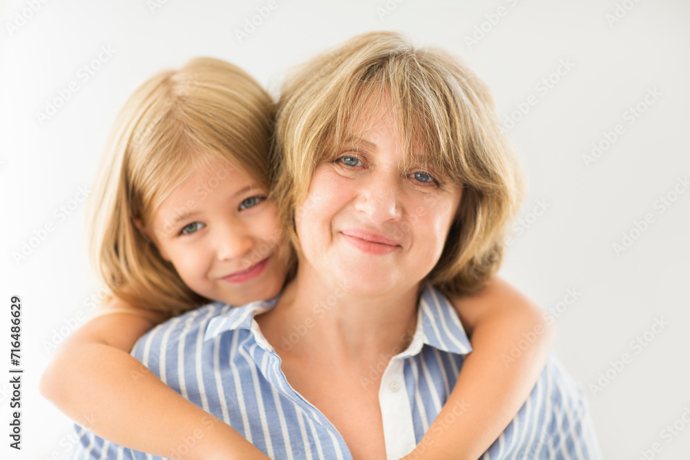 Mature woman embrace with young girl Mature woman embrace with young girl