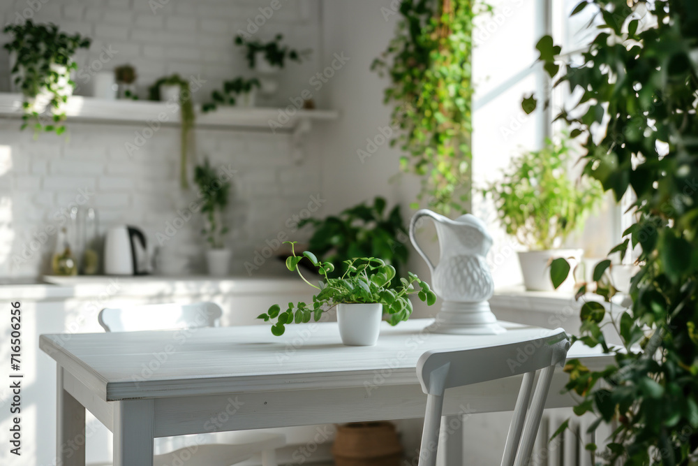 A modern, minimalistic kitchen with lush greenery, white interior, creating a stylish and fresh living space. A modern, minimalistic kitchen with lush greenery, white interior, creating a stylish and fresh living space.