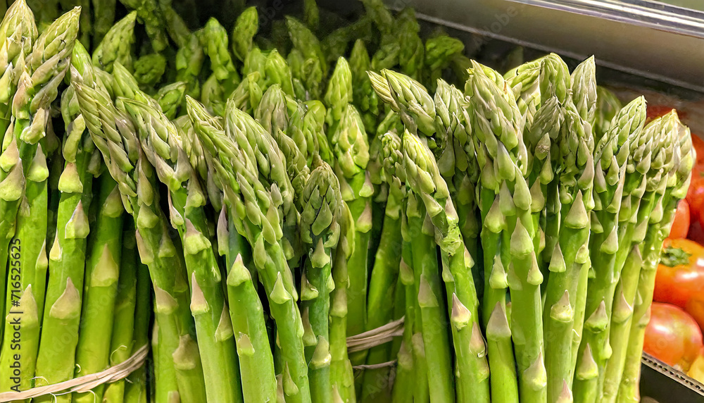 Fresh organic asparagus on a store counter Fresh organic asparagus on a store counter