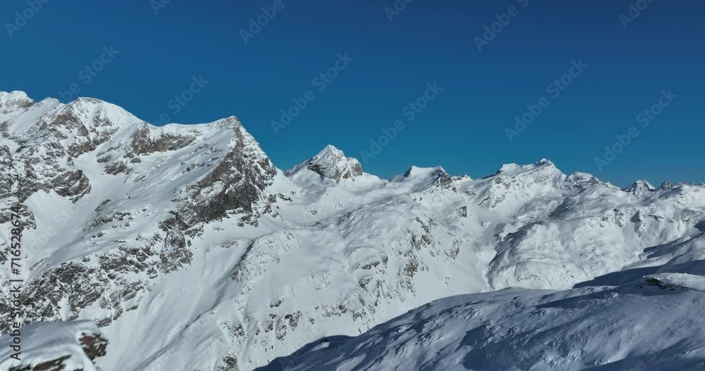 Winter drone shot of ski pistes and slopes covered with fresh powder snow in Tignes in Valdisere France Winter drone shot of ski pistes and slopes covered with fresh powder snow in Tignes in Valdisere France
