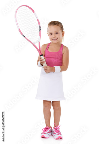 Tennis, sports and portrait of child on a white background for training, workout and exercise. Fitness, happy and isolated young girl with racket for hobby, activity and fun for wellness in studio