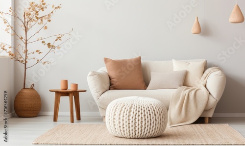 Interior design, detail of bright sofa with pillows and a warm blanket