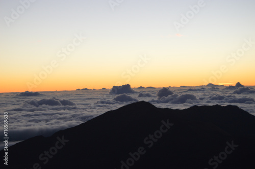 Sunrise Above the Clouds on Volcanic Landscape 