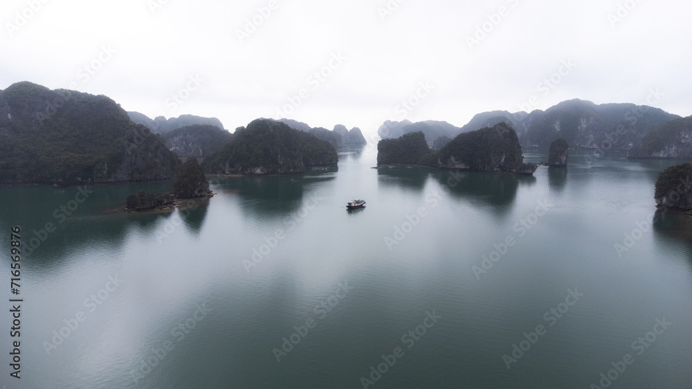 aerial drone view of foggy halong bay, vietnam