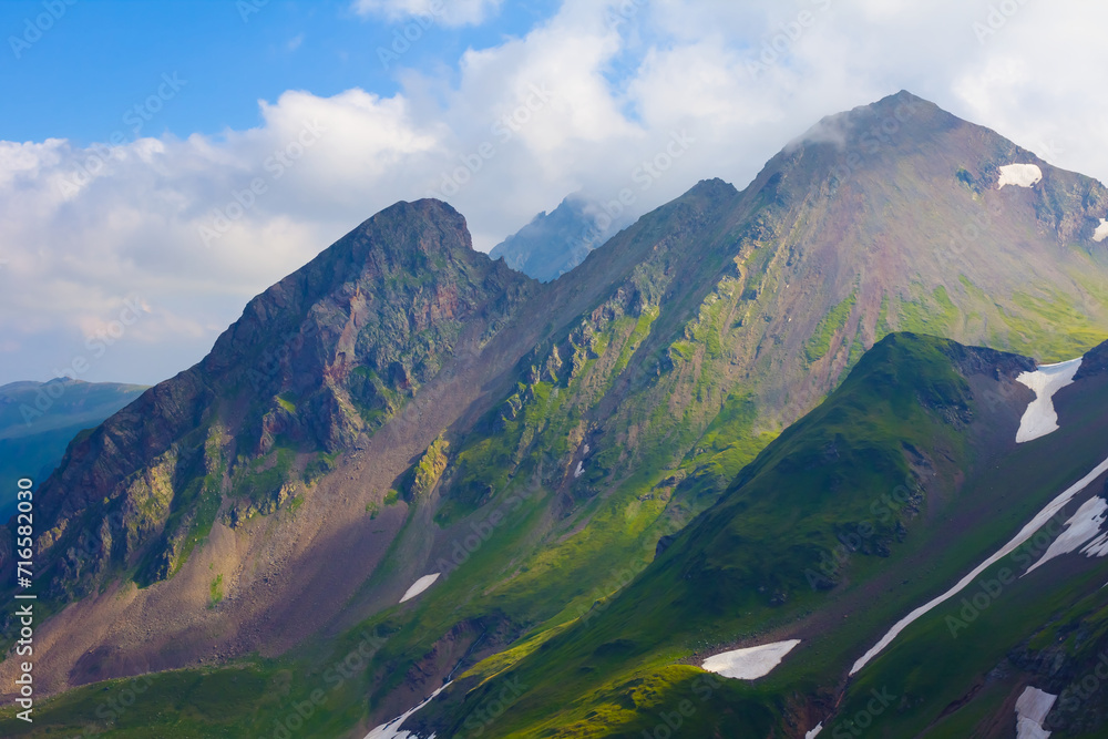 bautiful green mountain valley under cloudy sky bautiful green mountain valley under cloudy sky