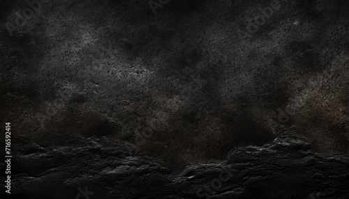 black or dark gray rough grainy stone or sand texture background