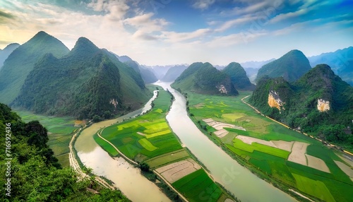 aerial landscape in phong nam valley an extreme scenery landscape at cao bang province vietnam with river nature green rice fields photo