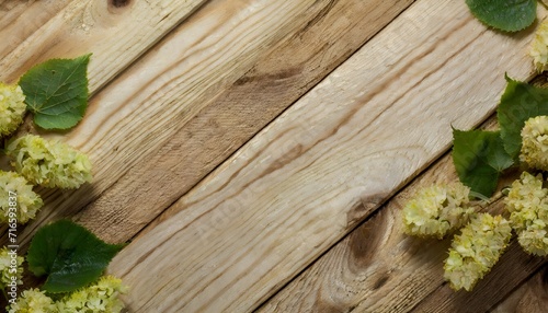 Linden wood board, close-up showcasing texture.Yellow tones and fiber layers create a harmonious composition, highlighting natural elegance.Close view invites appreciation of wood richness and beauty.