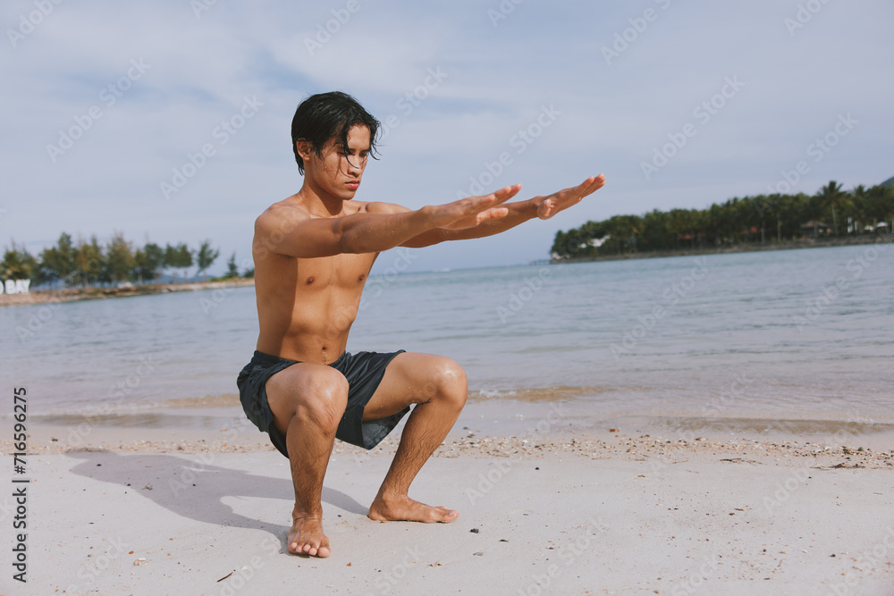 Active Asian Athlete Enjoying Sunset Run on the Beach Active Asian Athlete Enjoying Sunset Run on the Beach