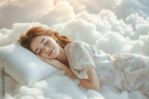 happy smiling young woman in pajamas sleeping on white clouds in the sky in sunlight