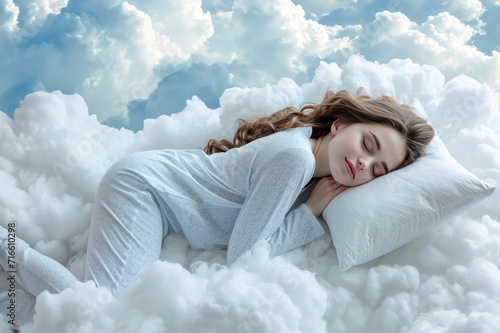 side view of happy young woman in pajamas sleeping on white clouds in the sky