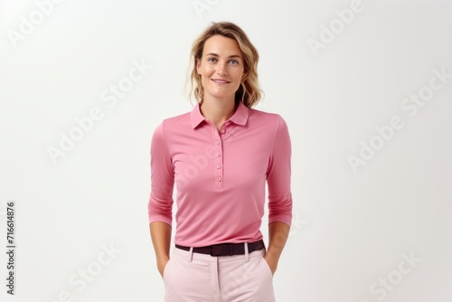 Portrait of a merry woman in her 30s wearing a breathable golf polo against a white background. AI Generation © CogniLens