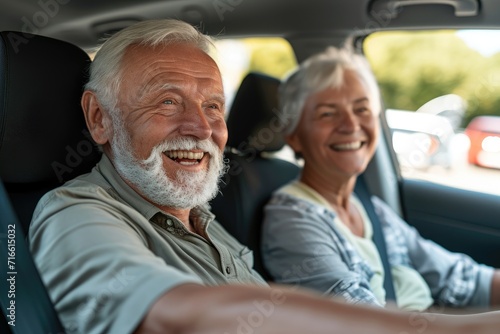 An elderly couple goes on a trip in their car © BraveSpirit