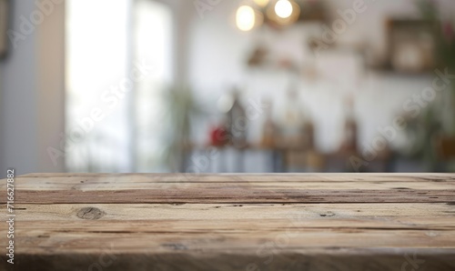 An empty wooden table top with a blurred modern office space background, featuring glass walls and a bright, airy atmosphere, suitable for product display or as a clean, minimalist workspace setting.  © qntn