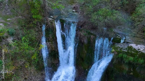 Aerial view from a drone of the Peñaladros waterfall around the town of Cozuela in the Angulo Valley. Las Merindades region. Province of Burgos. Spain. Europe photo