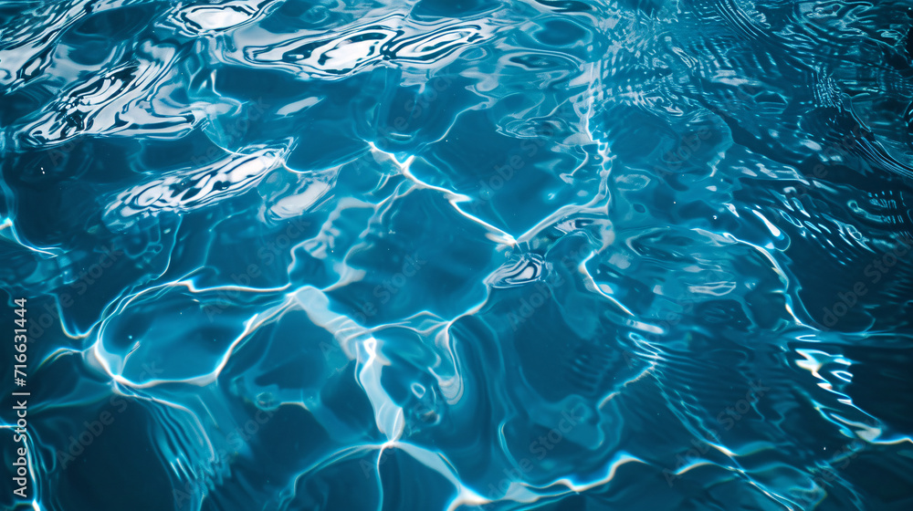 Obraz premium Water reflections, blue water surface background