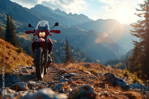 Mountain bike rider in helmet and sportswear riding on the trail in the high mountains. Motocross. Enduro. Extreme sport concept.