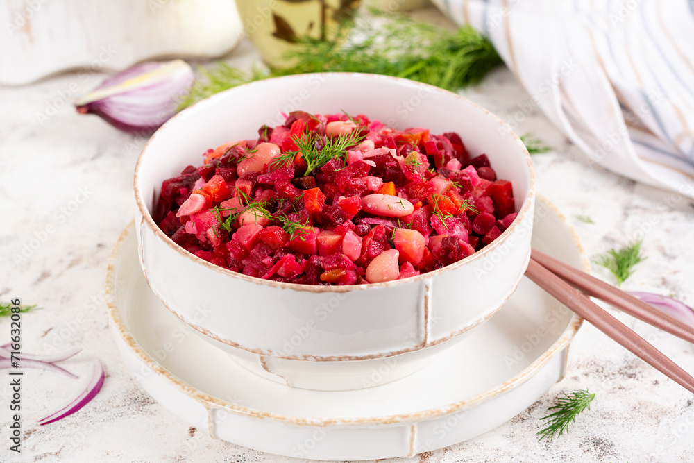 Beet Salad - Vinaigrette in a bowl. Dietary menu. Beet Salad. Salad of beetroot. Vegan food. Traditional ukrainian cuisine. Beet Salad - Vinaigrette in a bowl. Dietary menu. Beet Salad. Salad of beetroot. Vegan food. Traditional ukrainian cuisine.