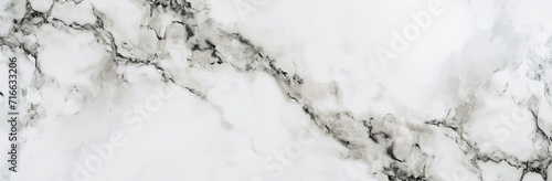 An elegant white marble texture with delicate grey veins, presenting a classic and sophisticated surface ideal for luxurious design elements or chic backgrounds. Ai generated © qntn