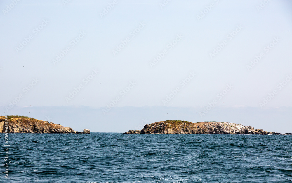 View of the coast of an island from the sea