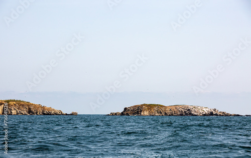 View of the coast of an island from the sea © rninov